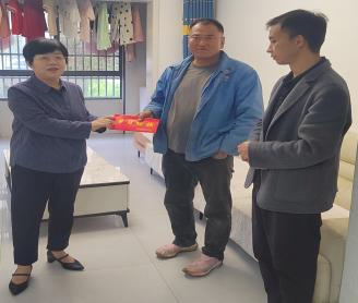 一线察实情 关怀暖残心